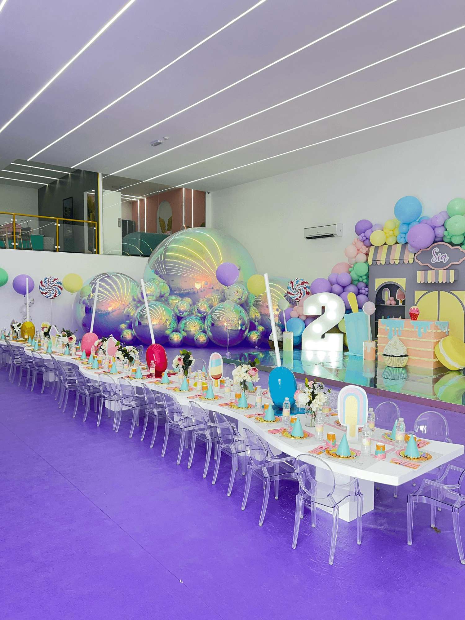 Pampa’s venue fully themed for a kids birthday with purple tables and pastel decorations