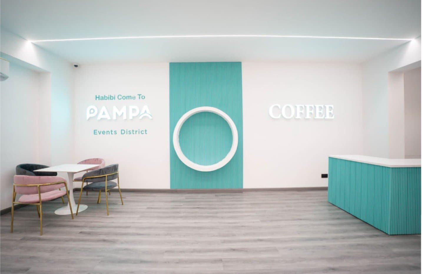 Pampa’s venue with its logo wall and café seating
